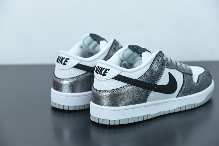 nike dunk low features silver cracked leather do5882-001